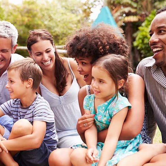 A community gathers in a park 